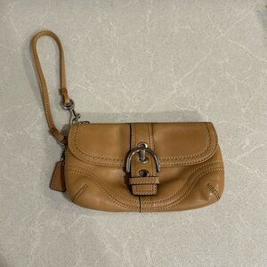 Coach wristlet and charm